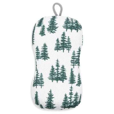 A white textured sponge with a dark green pine tree pattern, featuring a gray hanging loop at the top, shown against a plain white background.